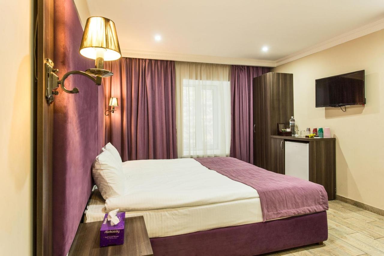 Baron ApartHotel Odesa Habitación foto